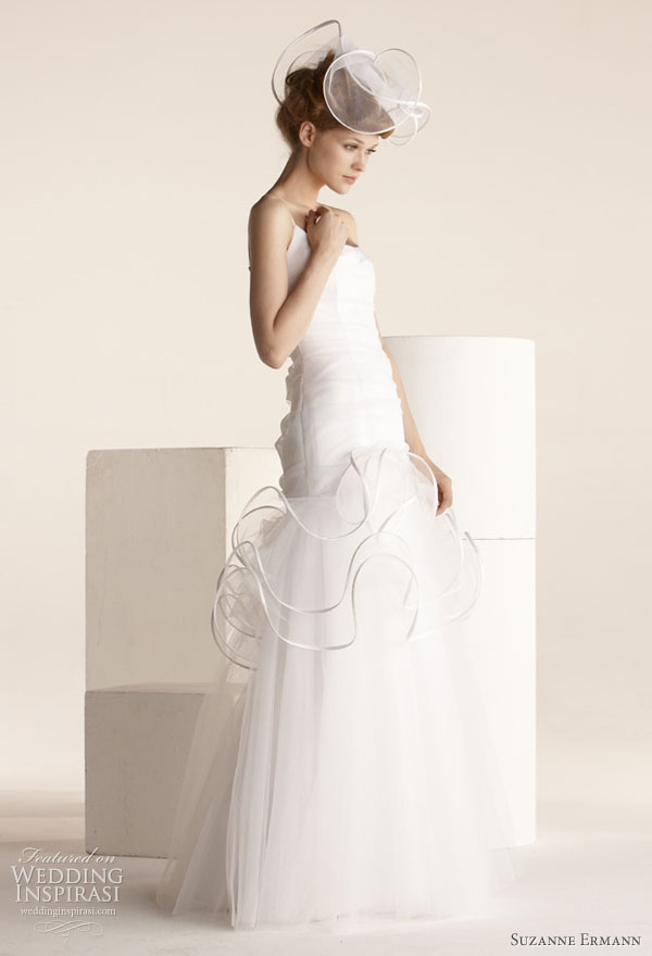 Suzanne Ermann wedding gowns 2011 SE Marier pret-a-porter bridal collection - Ginette, duchess satin dress draped with tulle and embellished with scrolls, neckline with thin straps.