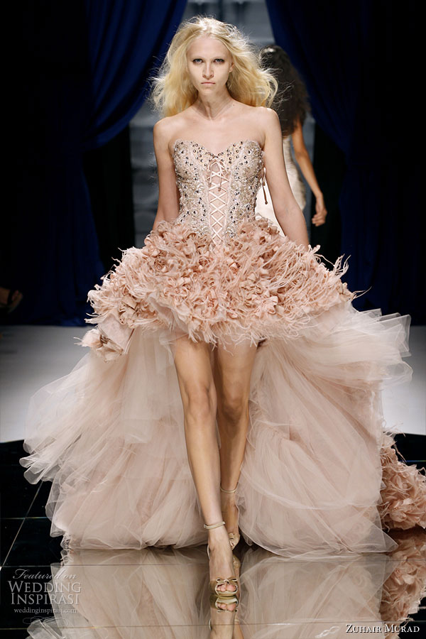 Dramatic mullet or short in front, long at the back dress, seen on a model on the runway of Zuhair Murad Couture Fall/Winter 2010-2011 fashion show