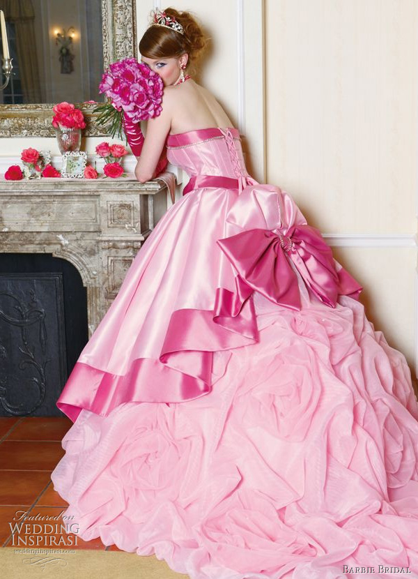 Cute pink wedding dress from Barbie Bridal - hot pink bow at the bustle highlighting gathered ball gown skirt