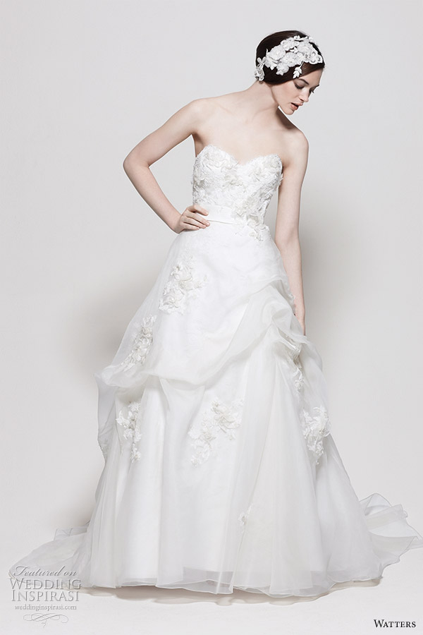 Watters wedding gowns 2011 - Patagonia Ivory Washed Silk Organza strapless gown with skirt pick ups and flower/lace embellishments Watters wedding gowns 2011 - Patagonia Ivory Washed Silk Organza strapless gown with skirt pick ups and flower/lace embellishments