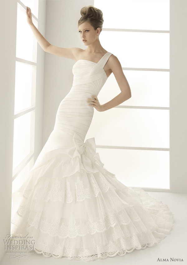 Magia one-shoulder taffeta and embroidered lace wedding dress by Alma Novia 2011