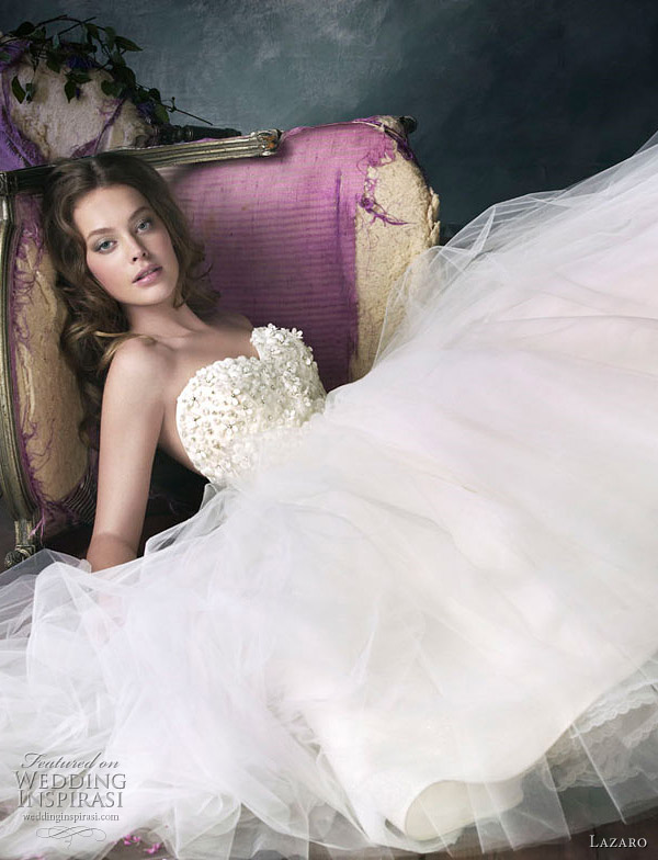 Lazaro Fall 2010 -vory godet tulle ball bridal gown, floral beaded sweetheart bodice, crystal trim at natural waist, circular tulle godet skirt, chapel train. Lazaro Fall 2010 -vory godet tulle ball bridal gown, floral beaded sweetheart bodice, crystal trim at natural waist, circular tulle godet skirt, chapel train.