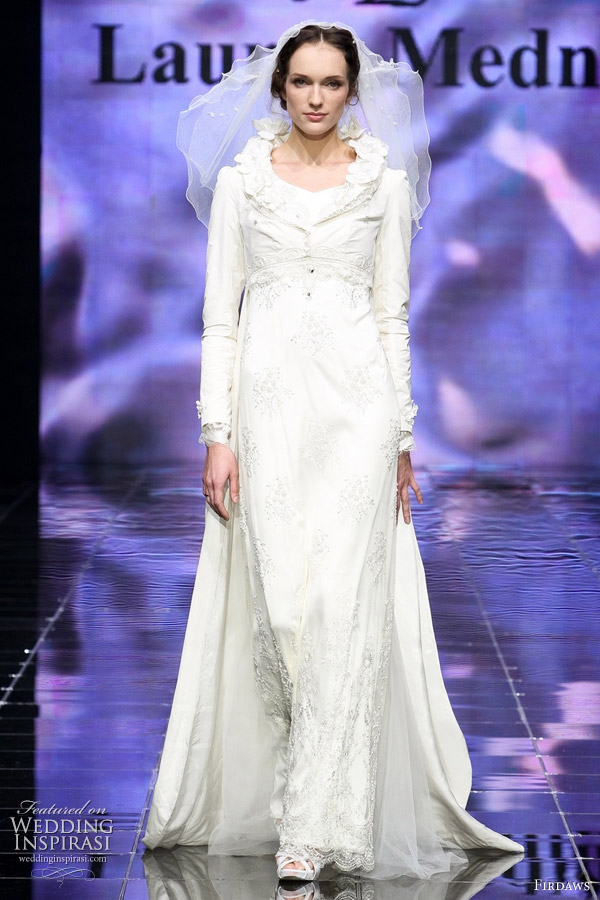 Long sleeve white wedding gown with unique collar by Laura and Medni for label Firdaws