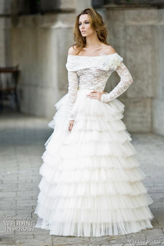 Off shoulder wedding gown with ruffle tier skirt