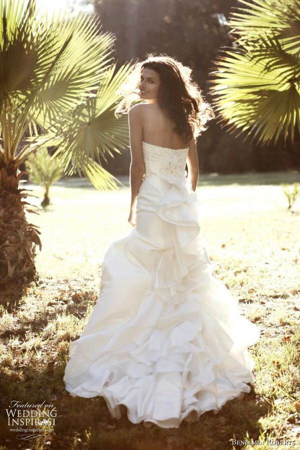 Benjamin Roberts wedding gown 2011 - ‘Spanish’ effect flamenco train contrasts with the plain taffeta A line front on this sweetheart, strapless gown.  