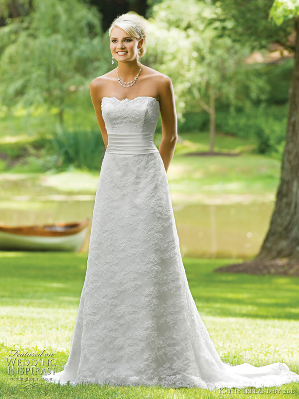 Spring 2011 Kathy Ireland weddings by 2be bridals - E231134 Strapless lace slim A-line gown with modified sweetheart neckline, pleated satin cummerbund, elegant satin bubble train. Removable straps included.