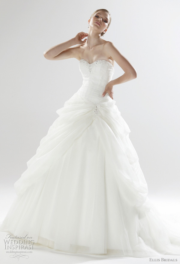 2011 tulle and taffeta wedding ball gown featuring illusion boned corset wrapped in pleated tulle with a voluminous draped skirt and crystal embellishment. From Ellis Bridal UK