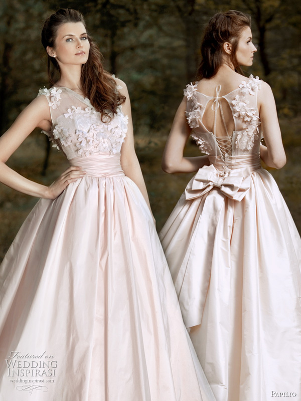Pink wedding dress by Papilio 2011 - Flower fields light rose gown featuring floral appliques on the bodice and bow at the back Pink wedding dress by Papilio 2011 - Flower fields light rose gown featuring floral appliques on the bodice and bow at the back