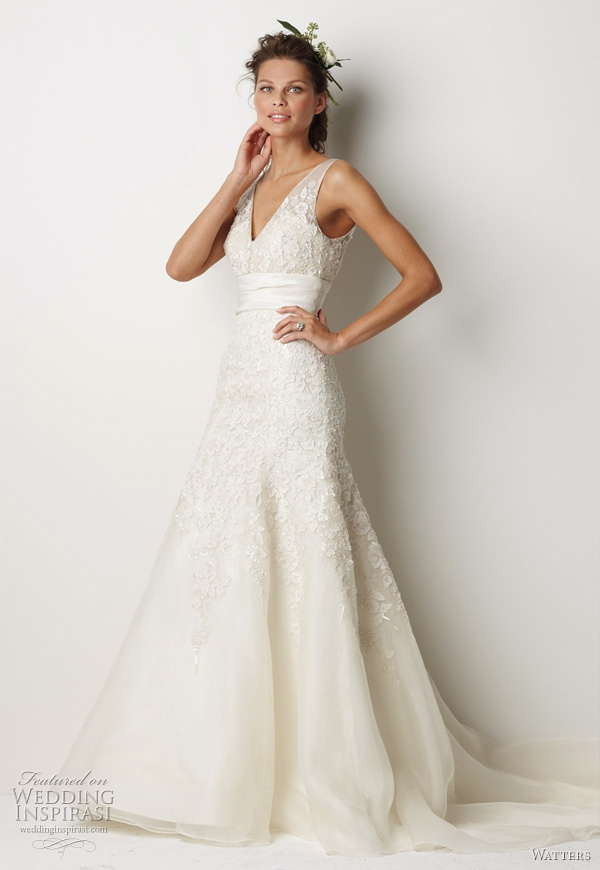 Watters Fall 2011 bridal collection - Sterling wedding dress: Ivory washed silk organza v-neck, fluted hem gown with ivory silk taffeta embroidery on bodice, skirt and solid ivory silk taffeta midriff. Gown is embroidered with vintage floral motifs using cotton thread, french knots, crystals, ivory silk taffeta strips and has a 73" Cathedral train. Watters Fall 2011 bridal collection - Sterling wedding dress:Ivory washed silk organza v-neck, fluted hem gown with ivory silk taffeta embroidery on bodice, skirt and solid ivory silk taffeta midriff. Gown is embroidered with vintage floral motifs using cotton thread, french knots, crystals, ivory silk taffeta strips and has a 73" Cathedral train.