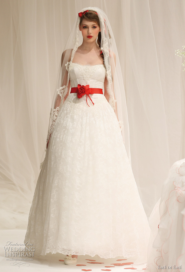 Emé di Emé 2011 bridal collection - white wedding dress with red sash belt, shown with veil Emé di Emé 2011 bridal collection - white wedding dress with red sash belt, shown with veil