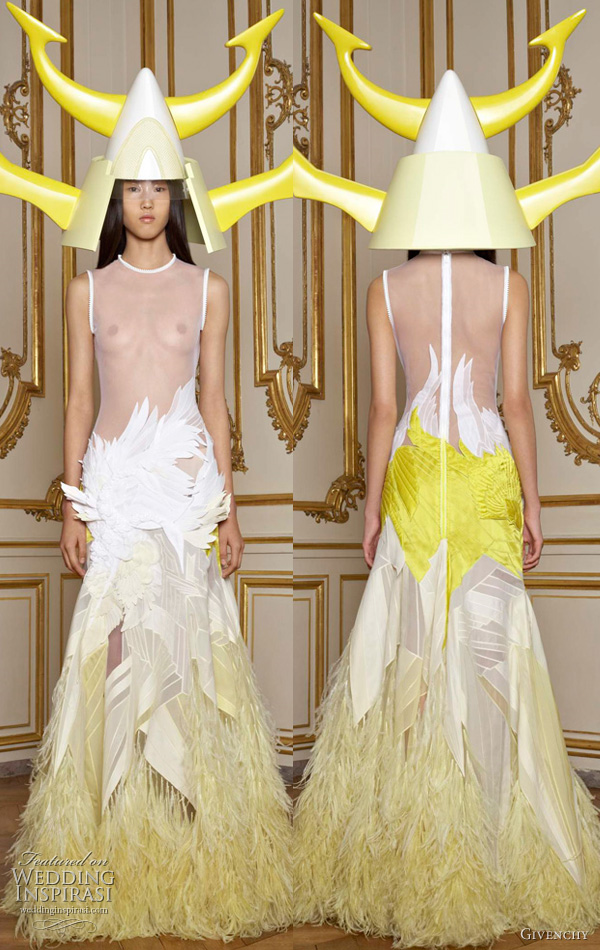 Horned helmet and neon splashes of color, seen on Riccardo Tisci's Givenchy Spring 2011 couture collection Horned helmet and neon splashes of color, seen on Riccardo Tisci's Givenchy Spring 2011 couture collection
