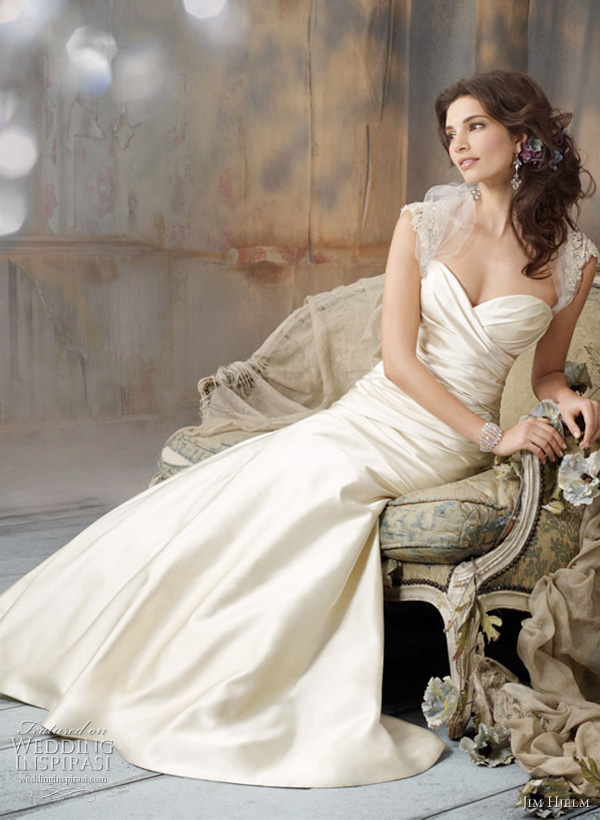 Spring 2011 Bridal collection Jim Hjelm Wedding Gowns - Style jh8106 - Antique Silk Faced Satin strapless A-line bridal gown, sweetheart neckline, elongated draped bodice, circular skirt, chapel train. Tulle Shrug accented with embroidered crystal sleeves.