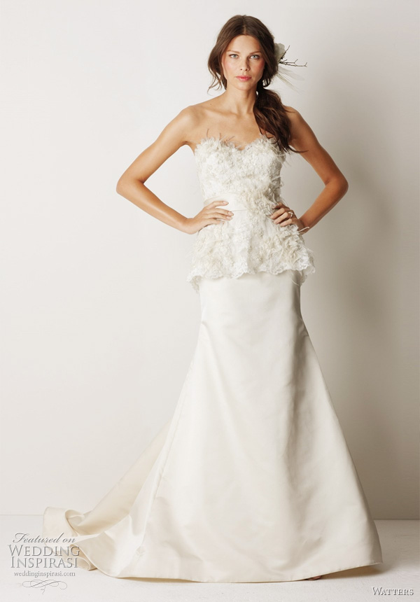 Watters Fall 2011 wedding gowns - Grafton Eggshell duchess silk satin sculpted neckline gown with ivory lace overlayed bodice and sheer lace peplum. Lace is embellished with ivory organza flowers, ostrich feathers and crystals. Dress has a 58" Sweep train. Watters Fall 2011 wedding gowns - Grafton Eggshell duchess silk satin sculpted neckline gown with ivory lace overlayed bodice and sheer lace peplum. Lace is embellished with ivory organza flowers, ostrich feathers and crystals. Dress has a 58" Sweep train.