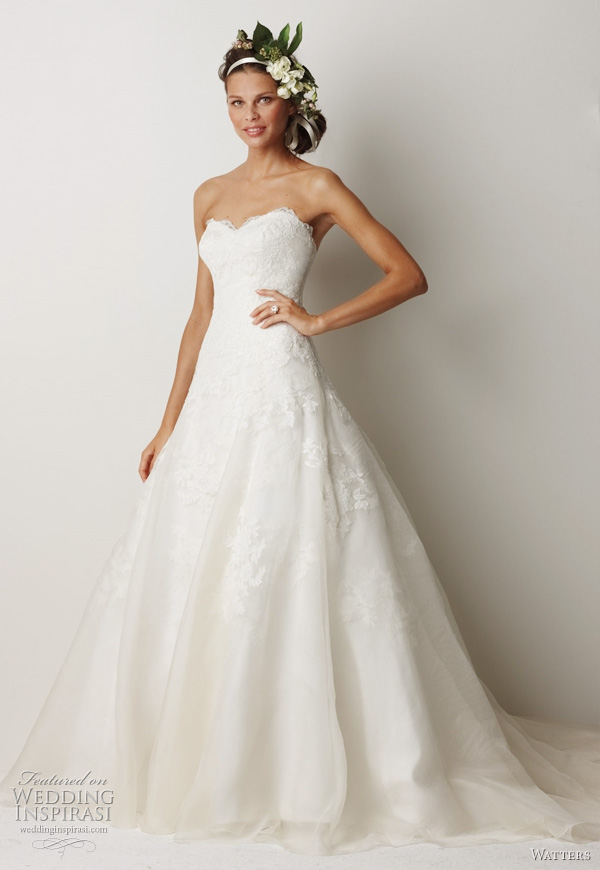 2011 wedding dress  from Watters bridal collection -  Devenport Ivory re-embroidered lace and washed silk organza gown with full A-line skirt and veiled lace motifs on skirt. Dress has a 71" train.