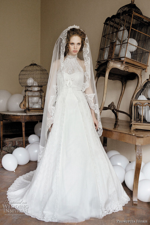 Pronuptia Paris 2011 collection  - Prestigieuse féérie wedding dress with high neck - American armhole dress in pleated organza and lace all in a highly feminine transparency. Micro-pearling gives it a dazzling appearance