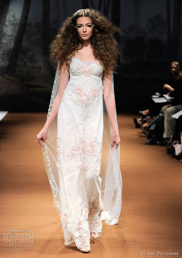 empire wedding dresses 2011 - Claire Pettibone RHOSWEN Empire silhouette with soft pink flowers and ivory tulle embellishments.