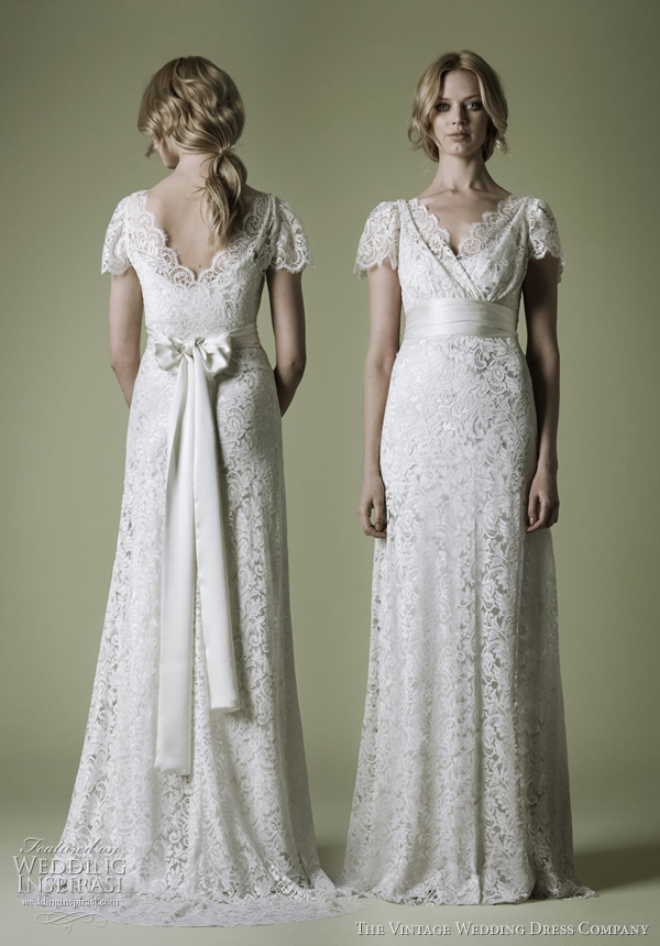 The Vintage Wedding Dress Company - 1930s' style lace wedding dress combines glamorous silhouette with an ornate French lace to create the perfect blend of fluidity and sophistication. The crossover bodice high empire line and bias-cut slip combine to create an extremely flattering shape. Choose to personalise your dress with matching lace or chiffon butterfly sleeves or a bespoke beaded neckline. Handmade in the UK in a sumptuous heavy crêpe silk satin and corded French lace. The Vintage Wedding Dress Company - 1930s' style lace wedding dress combines glamorous silhouette with an ornate French lace to create the perfect blend of fluidity and sophistication. The crossover bodice high empire line and bias-cut slip combine to create an extremely flattering shape. Choose to personalise your dress with matching lace or chiffon butterfly sleeves or a bespoke beaded neckline. Handmade in the UK in a sumptuous heavy crêpe silk satin and corded French lace.