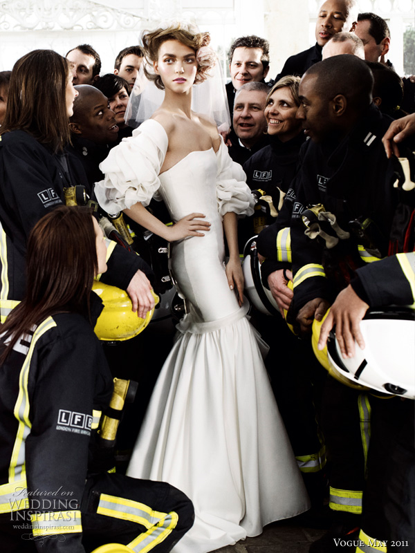 carolina herrera wedding dress - model Arizona Muse in silk mikado bustier gown with draped organza applique and threadwork embroidery and organza bolero both from Carolina Herrera, surrounded by London firefighters, shot by Mario Testino for British Vogue May Royal Wedding issue May 2011