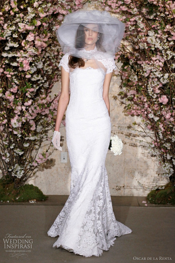 oscar de la renta spring 2012 bridal collection - wedding dress Silk faille strapless trumpet gown with corded chantilly lace overlay worn with corded chantilly lace and tulle bolero, straw wide brim hat with draped tulle and silk flowers. oscar de la renta spring 2012 bridal collection - wedding dress Silk faille strapless trumpet gown with corded chantilly lace overlay worn with corded chantilly lace and tulle bolero, straw wide brim hat with draped tulle and silk flowers.