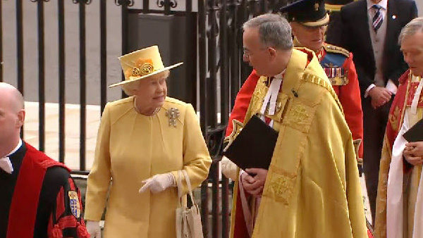 The Queen in yellow arrive at Westminster Abbey for the  royal wedding of her grandson Prince William to Catherine Middleton