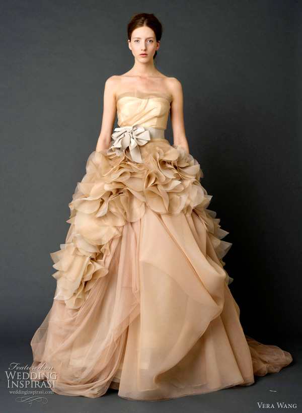 vera wang 2012 - Pale nude one-shoulder organza ballgown wedding dress with draped tulle petal detail and grosgrain multi-bow sash.