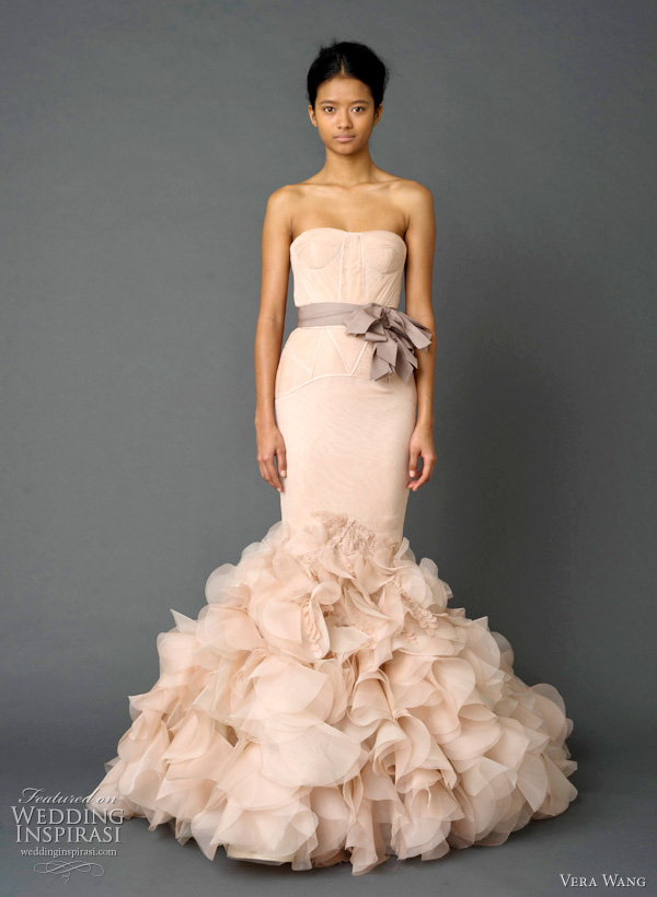 vera wang wedding dresses spring 2012 - Pale pink strapless mermaid gown with pleated chiffon bodice, tissue organza blossom peplum with draped petal technique detail and grosgrain multi-bow sash.