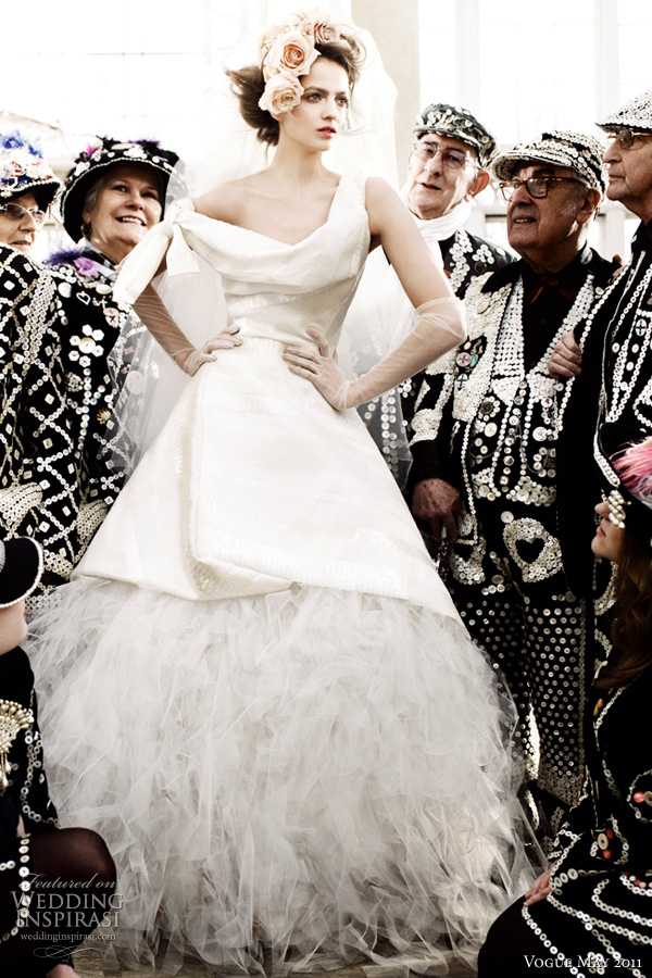 vivienne westwood wedding dress vogue - Model Irina in a silk gown with draped neckline and tulle underskirt by Vivienne Westwood, surrounded by Cockney Costermongers shot by Mario Testino for British Vogue Royal Wedding issue May 2011