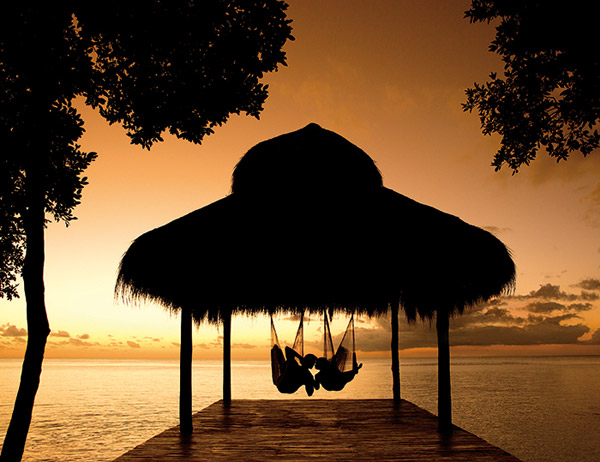 secrets resorts spas aura cozumel wedding gazebo hammock sunset romantic destination wedding