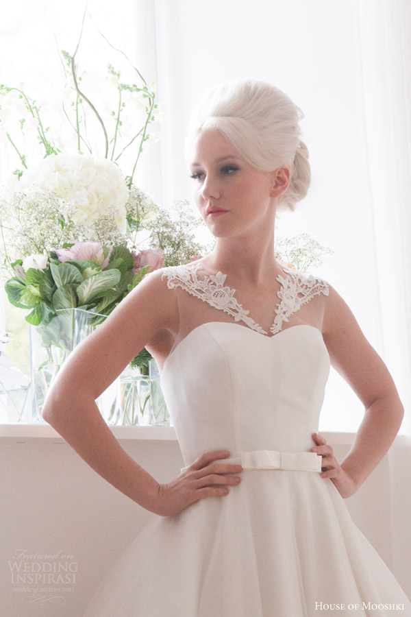 house of mooshki bridal 2016 nora sleeveless calf tea length 1950s wedding dress illusion neckline lace hem detail close up bodice house of mooshki bridal 2016 nora sleeveless calf tea length 1950s wedding dress illusion neckline lace hem detail close up bodice