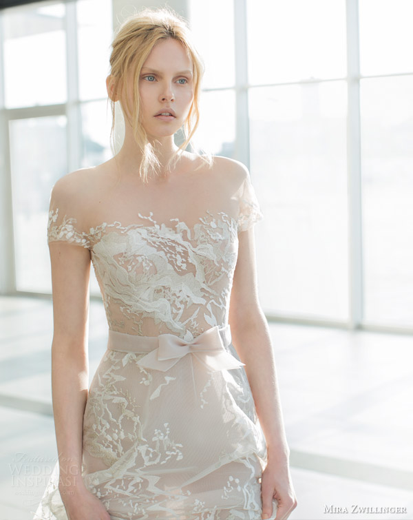 mira zwilinger 2016 stardust bridal sienna nude organza short sleeve wedding dress abstract lace illusion neckline organza bow belt close up mira zwilinger 2016 stardust bridal sienna nude organza short sleeve wedding dress abstract lace illusion neckline organza bow belt close up