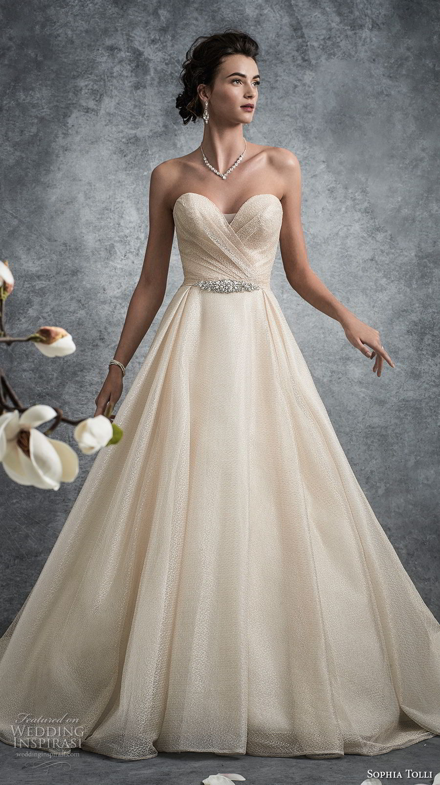 sophia tolli fall 2017 bridal strapless sweetheart neckline wrap over bodice romantic elegant champagne color a line wedding dress chapel train (12) mv sophia tolli fall 2017 bridal strapless sweetheart neckline wrap over bodice romantic elegant champagne color a line wedding dress chapel train (12) mv
