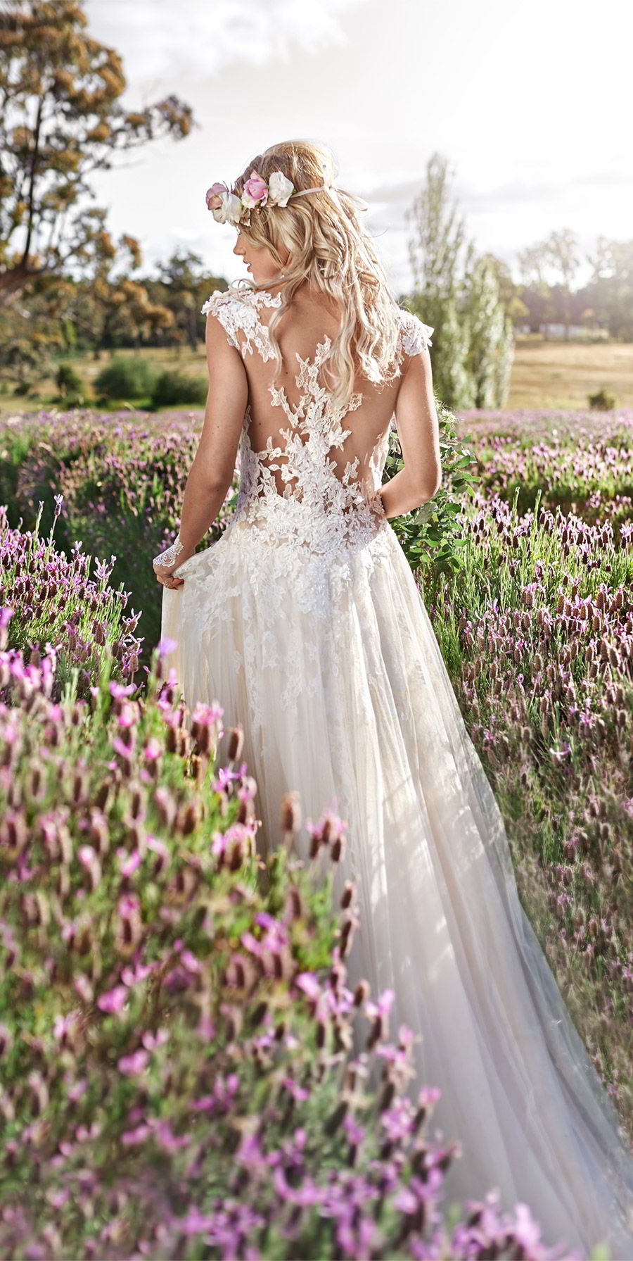 lavender field wedding photo shoot adorn invitations purple gold boho luxe inspiration romantic lace wedding dress back field