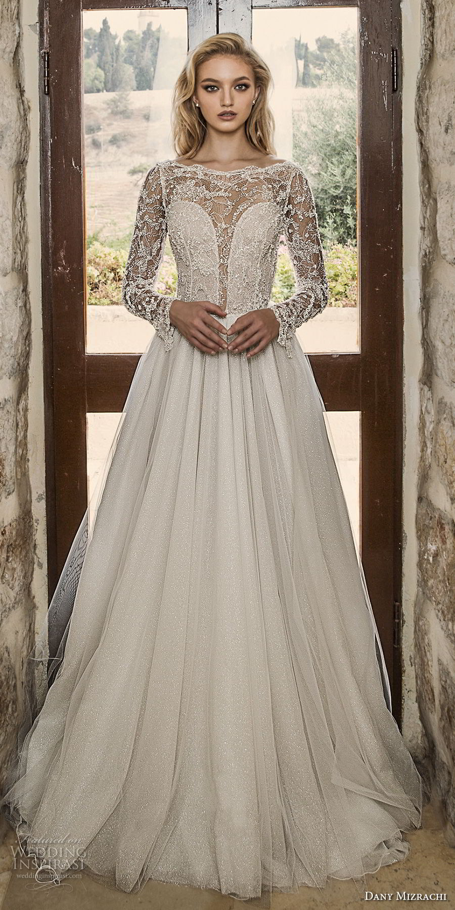 dany mizrachi spring 2018 bridal long sleeves bateau neck heavily embellished bodice glamorous a line wedding dress open v back sweep train (4) mv fv dany mizrachi spring 2018 bridal long sleeves bateau neck heavily embellished bodice glamorous a line wedding dress open v back sweep train (4) mv fv
