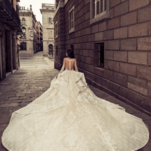 julia kontogruni 2018 bridal long sleeves deep plunging sweetheart neckline full embellishment peplum princess ball gown wedding dress sheer button back royal train (8) bv