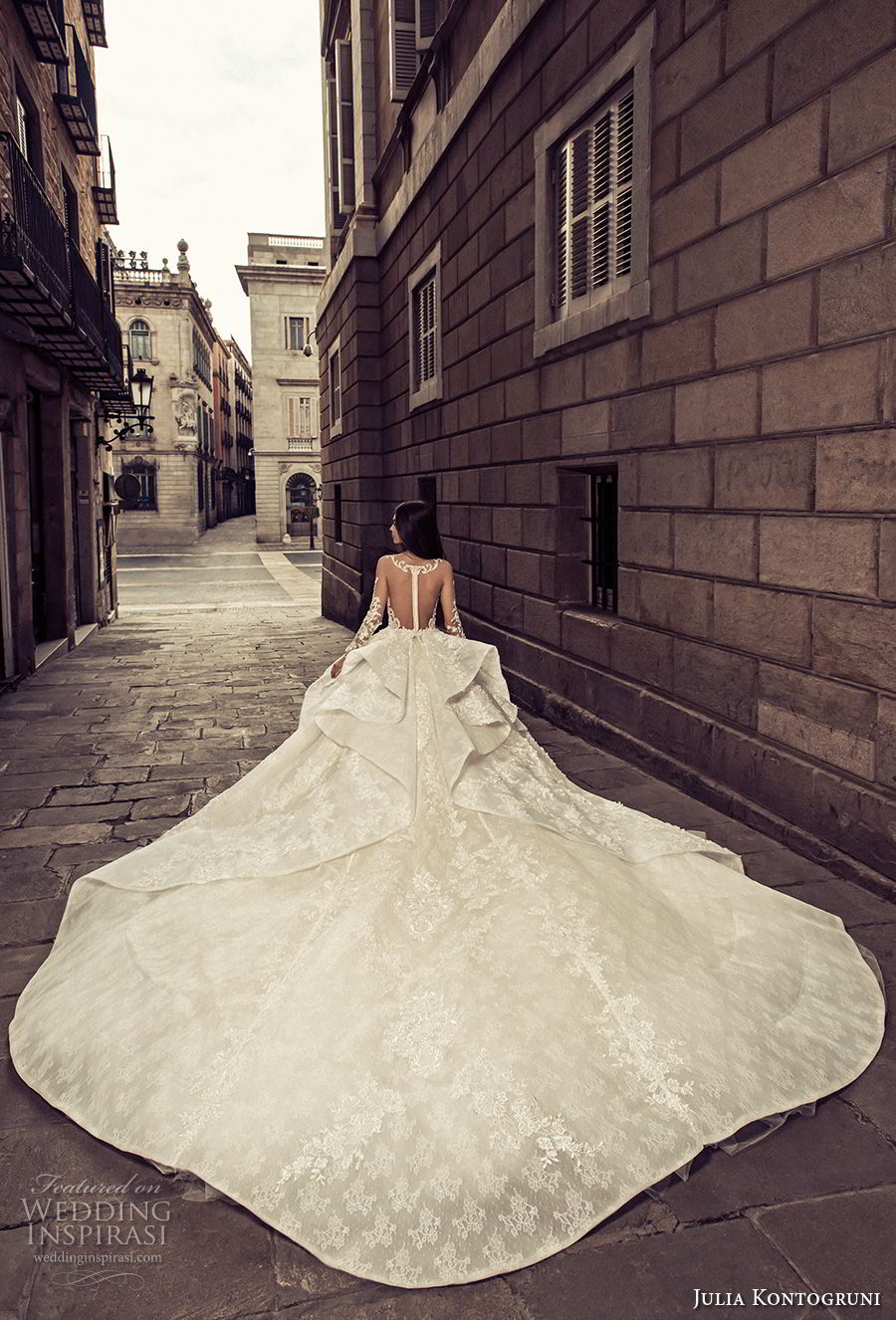 julia kontogruni 2018 bridal long sleeves deep plunging sweetheart neckline full embellishment peplum princess ball gown wedding dress sheer button back royal train (8) bv