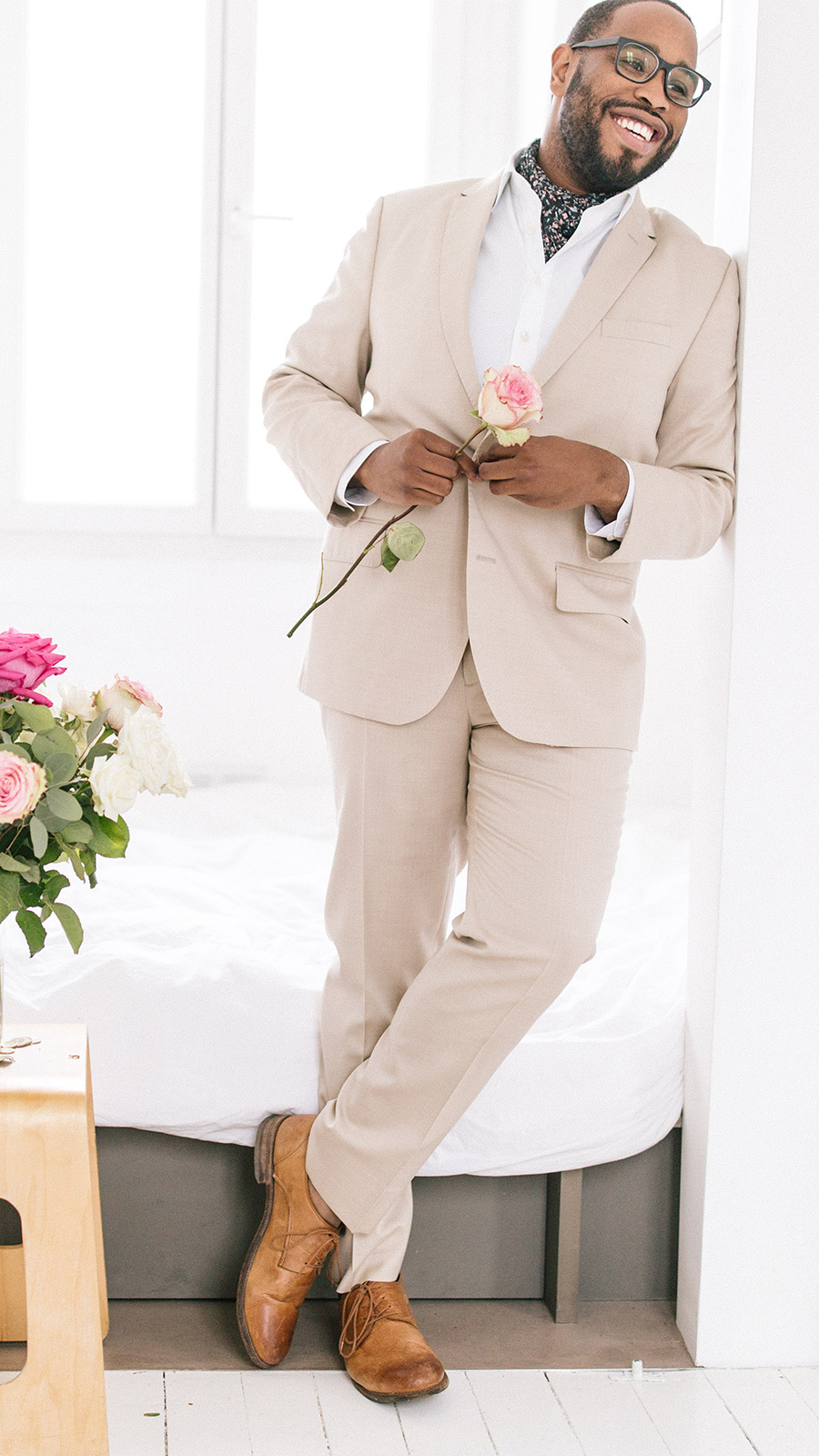 the black tux wedding dress code casual groomsmen guest summer wedding tan suit no tie brown shoes