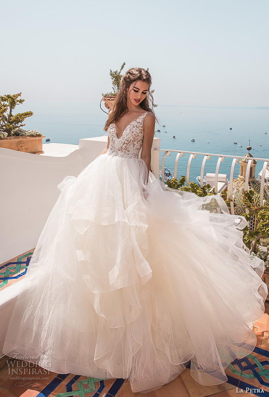 la petra 2019 bridal sleeveless v neck heavily embellished bodice tiered skirt romantic ball gown a  line wedding dress backless scoop back chapel train (9) mv