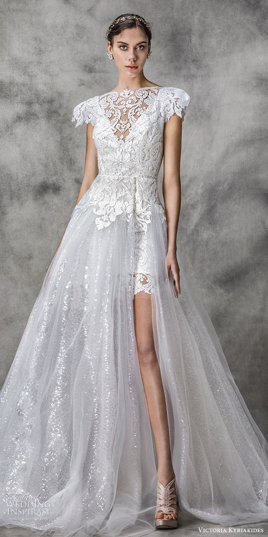 victoria kyriakides spring 2020 bridal short puff sleeves bateau neckline slit skirt fully embellished lace a line ball gown wedding dress (5) chapel train modern romantic mv