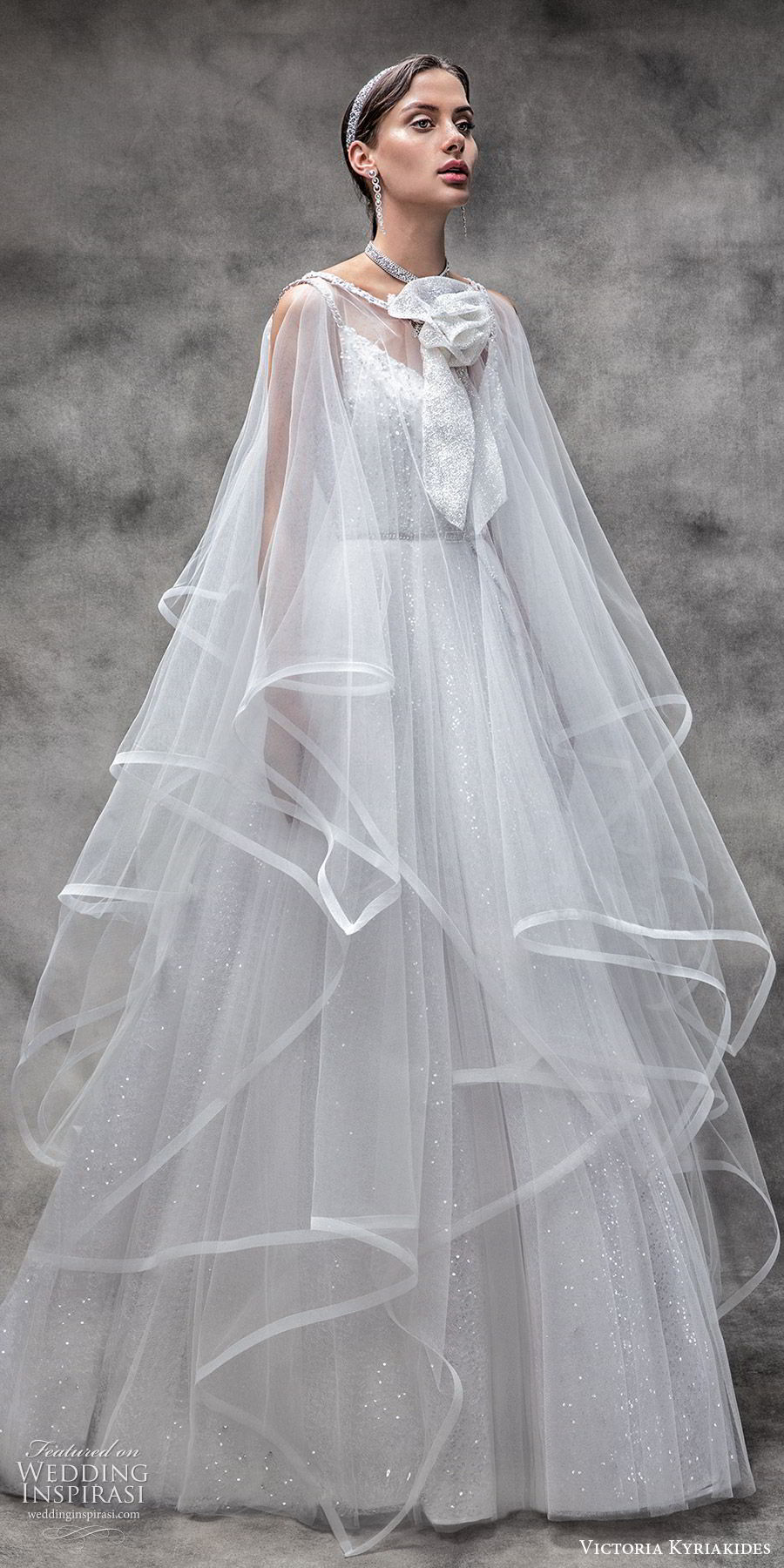 victoria kyriakides spring 2020 bridal sleeveless beaded straps v neck fully embellished a line ball gown wedding dress (11) glitzy romantic sheer cape overskirt mv