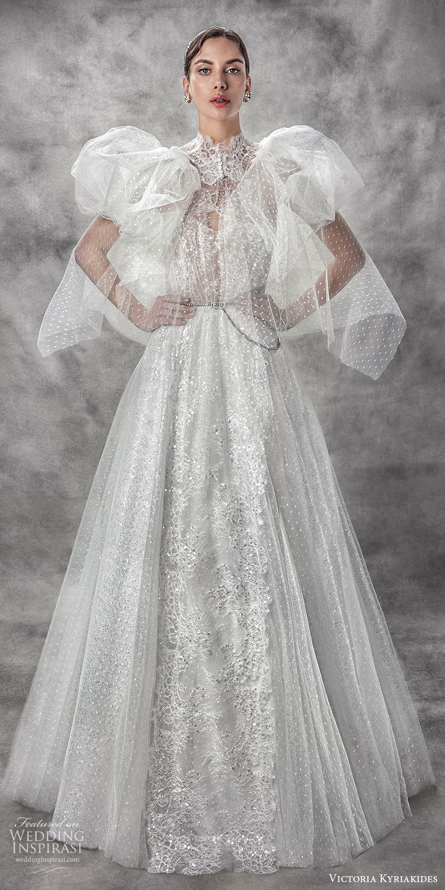 victoria kyriakides spring 2020 bridal sleeveless halter neck sheer bodice sweetheart fully embellished a line ball gown wedding dress (3) sheer puff sleeve cape glitzy romantic mv