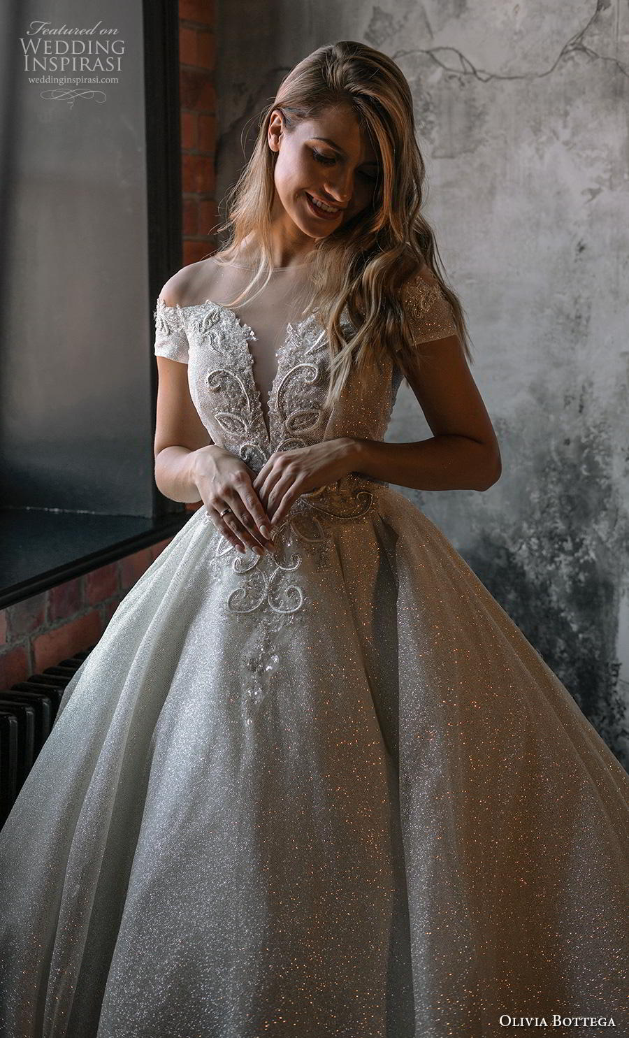 olivia bottega 2020 bridal short sleeves deep plunging sweetheart neckline heavily embellished bodice glamorous princess ball gown a  line wedding dress sheer button v back royal train (1) zv