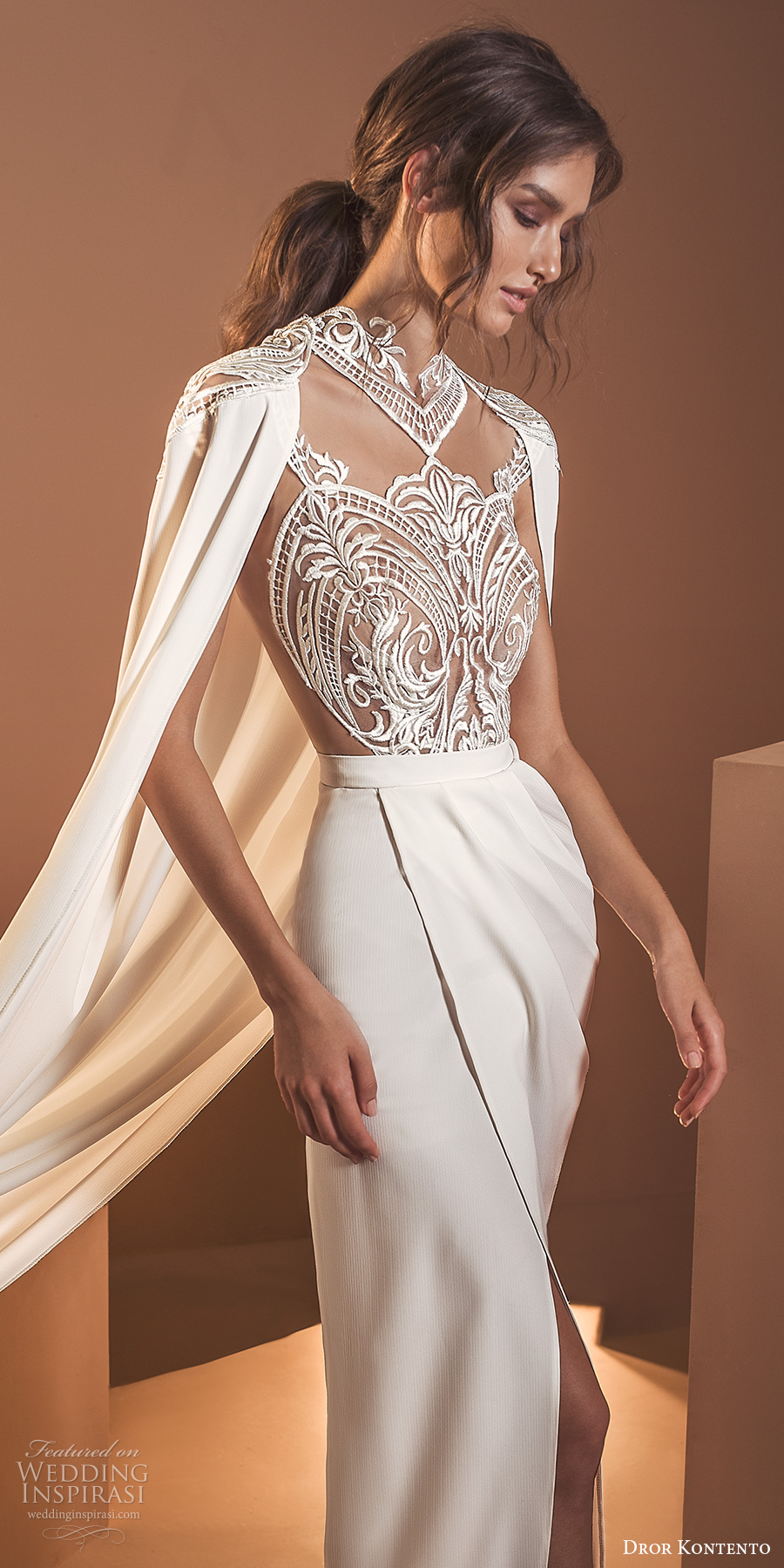 dror kontento 2020 bridal long cape sleeves high neckline embellished lace sheer bodice column sheath wedding dress with cape slit skirt chapel train (6) zv dror kontento 2020 bridal long cape sleeves high neckline embellished lace sheer bodice column sheath wedding dress with cape slit skirt chapel train (6) zv