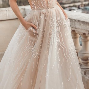 eisen stein fall 2020 bridal sleeveless with strap deep plunging v neck light embellishment romantic sexy nude color a  line wedding dress with pockets backless v back chapel train (6) zv
