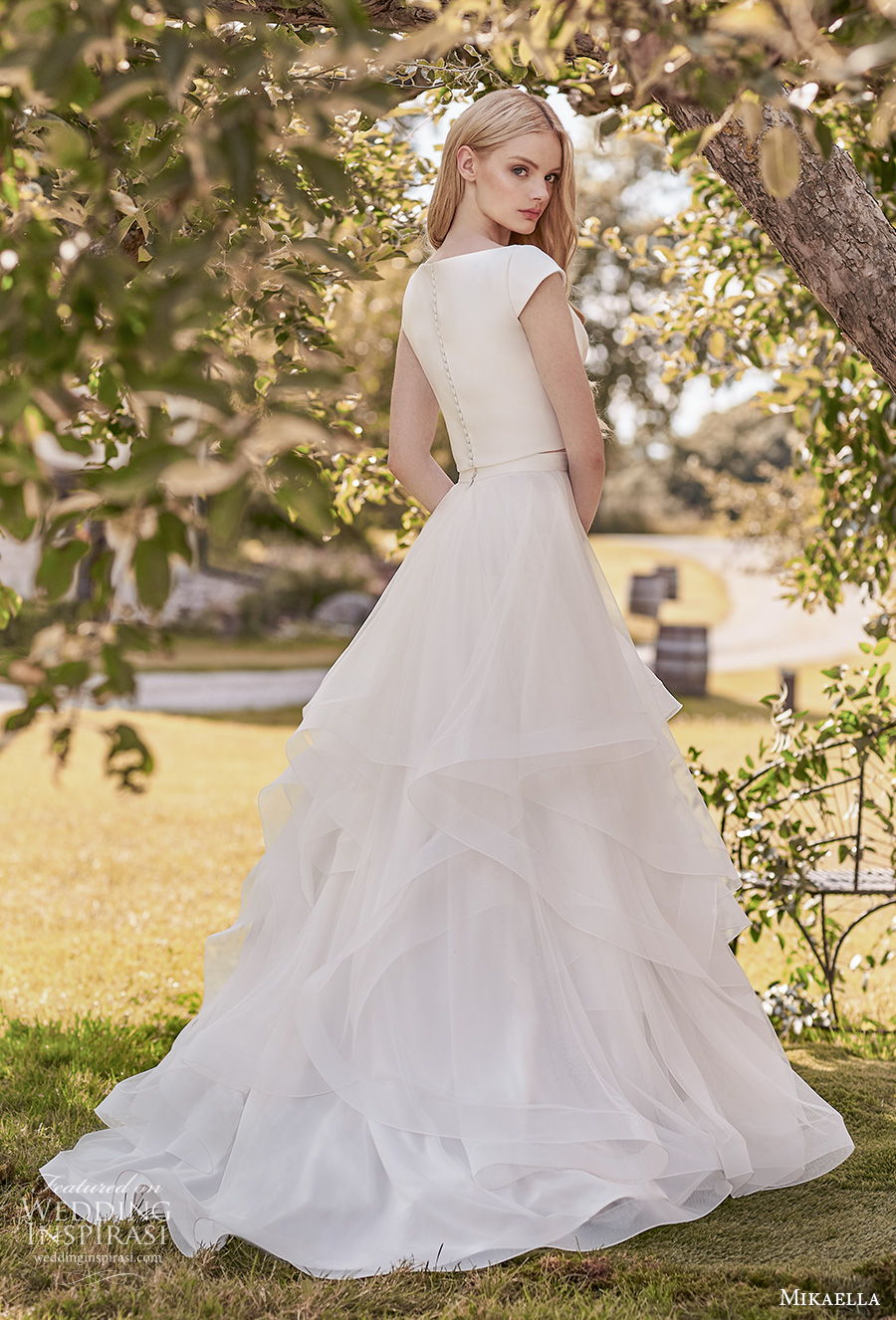 mikaella spring 2020 bridal cap sleeves bateau simple minimalist tiered skirt classic modest a line wedding dress covered back sweep train (9) bv mikaella spring 2020 bridal cap sleeves bateau simple minimalist tiered skirt classic modest a line wedding dress covered back sweep train (9) bv