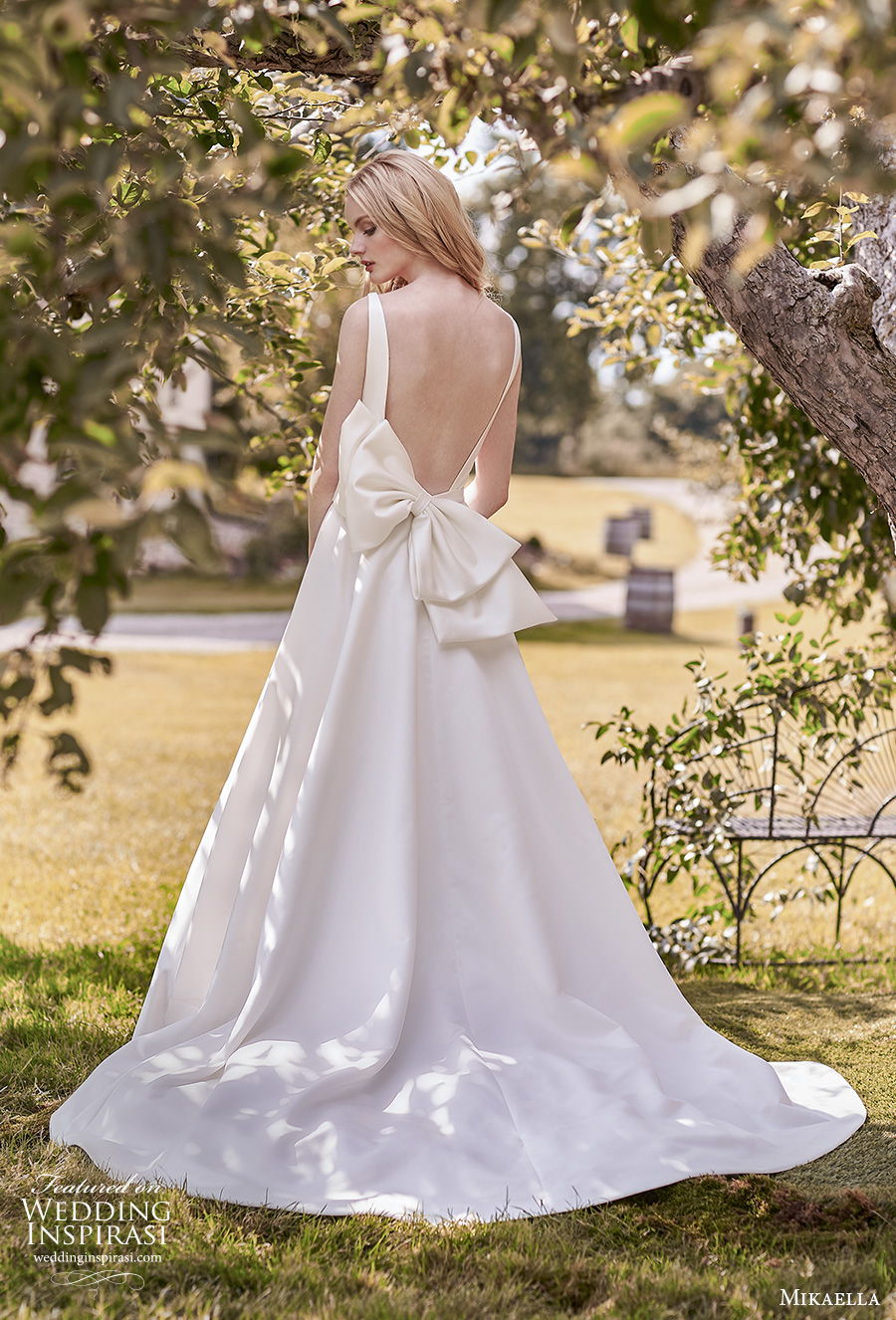 mikaella spring 2020 bridal sleeveless bateau neckline simple minimalist open side elegant a line wedding dress with pockets backless ribbon back medium train (16) bv mikaella spring 2020 bridal sleeveless bateau neckline simple minimalist open side elegant a line wedding dress with pockets backless ribbon back medium train (16) bv