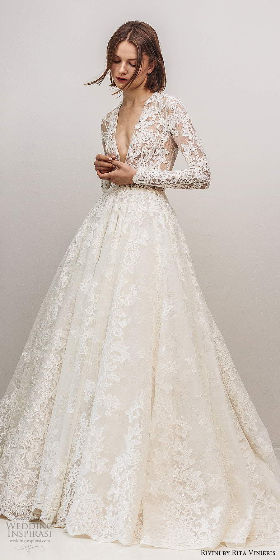 rivini by rita vinieris fall 2020 bridal long sleeves plunging v neckline fully embellished lace a line ball gown wedding dress chapel train (1) mv