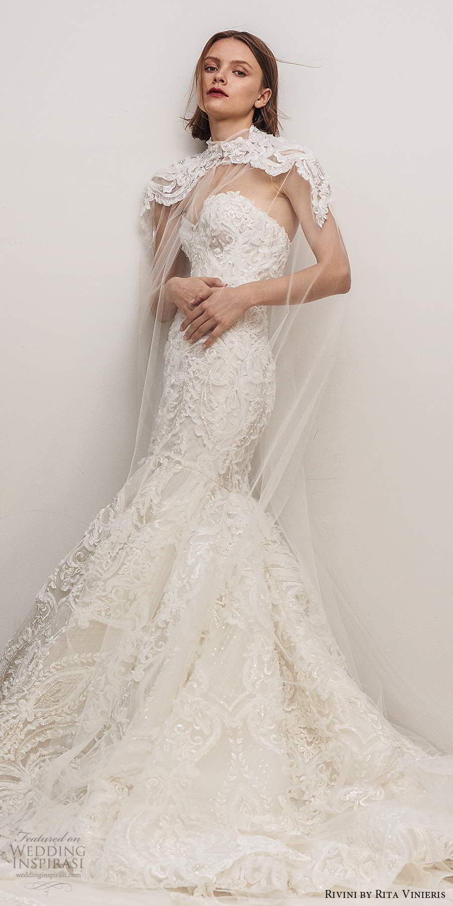 rivini by rita vinieris fall 2020 bridal strapless sweetheart neckline fully embellished fit flare mermaid wedding dress chapel train sheer cape (2) mv