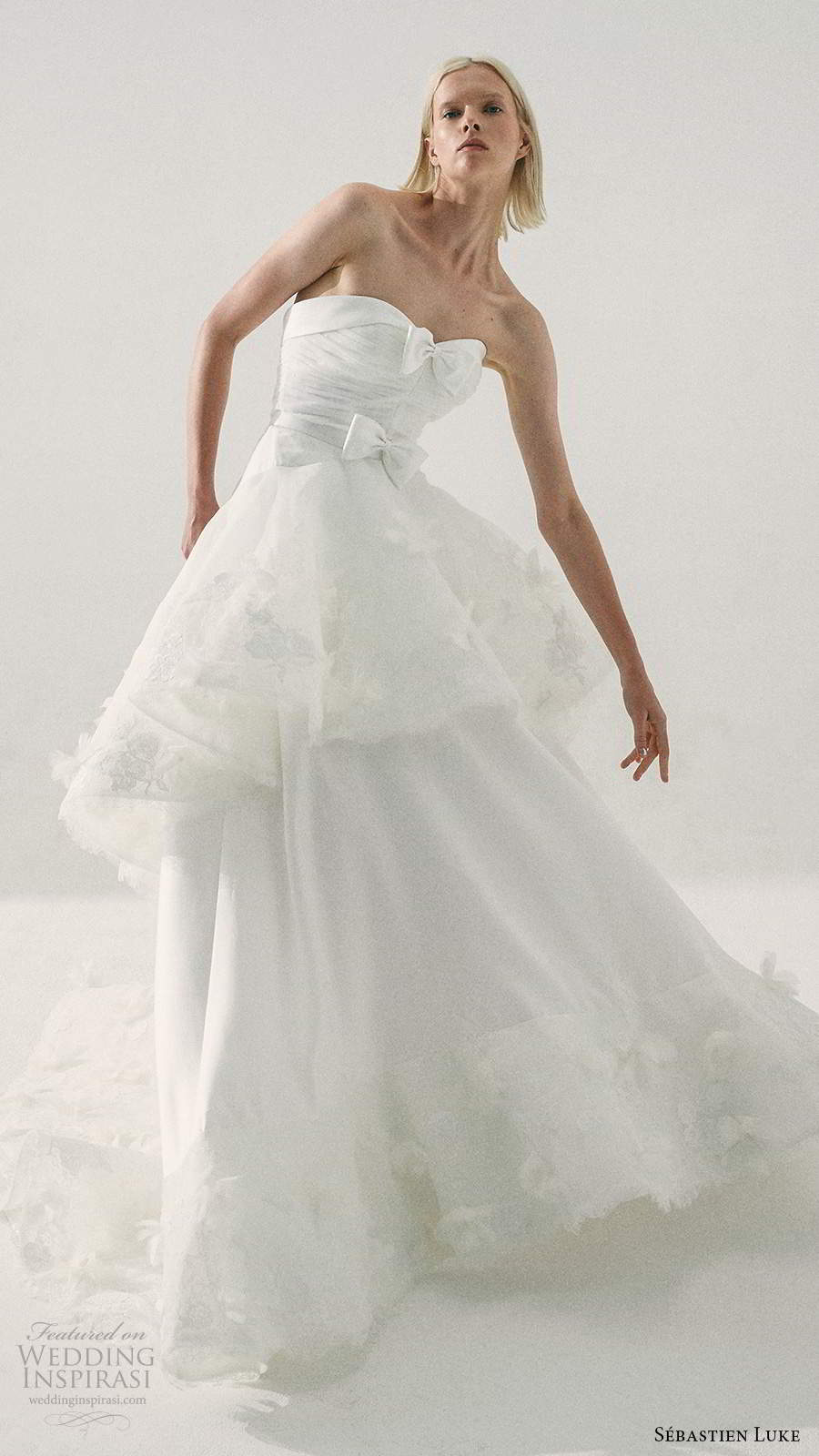 sebastien luke fall 2020 bridal strapless semi sweetheart neckline ruched bodice a line ball gown wedding dress tiered skirt (2) mv