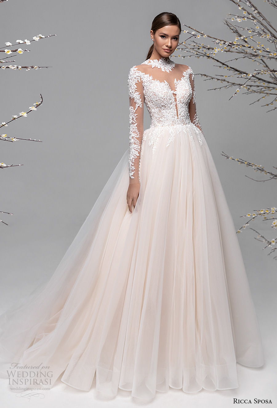 ricca sposa spring 2021 bridal long sleeves illusion high neck v neck heavily embellished bodice romantic blush a  line wedding dress sheer button back chapel train (13) mv