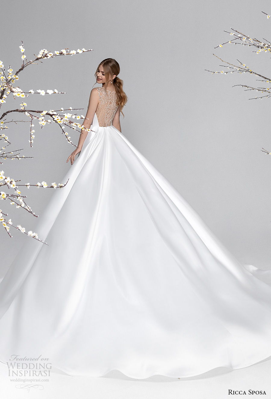 ricca sposa spring 2021 bridal sleeveless illusion bateau straight across neckline simple clean minimalist princess ball gown a  line wedding dress embellished back royal train (7) bv